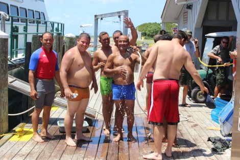 The men were in great spirits as they washed the saltwater from their bodies. Photo Source: Matthew Toro. August 4, 2015.