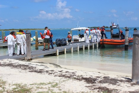 A few hours after arriving at Dry Tortugas, the men are escorted out of the national park by the US Coast Guard. Photo Source: Matthew Toro. August 4, 2015.