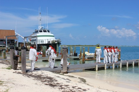 A few hours after arriving at Dry Tortugas, the men are escorted out of Dry Tortugas National Park by the US Coast Guard. Photo Source: Matthew Toro. August 4, 2015.